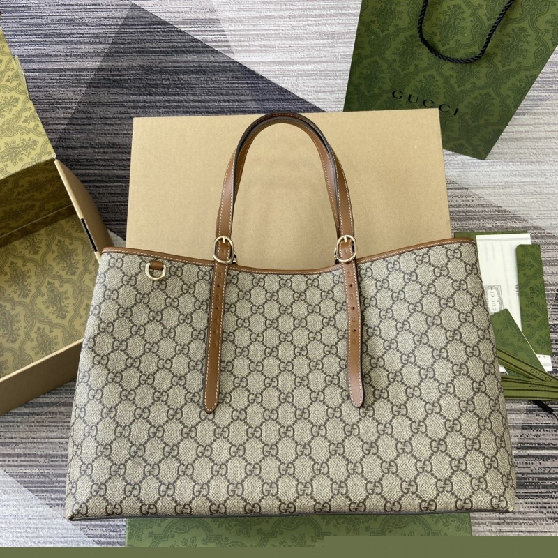 G*u*i shopping bags